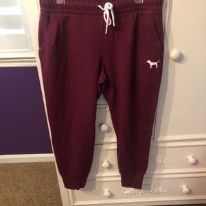 Burgundy pink sweats/joggers with pink on butt